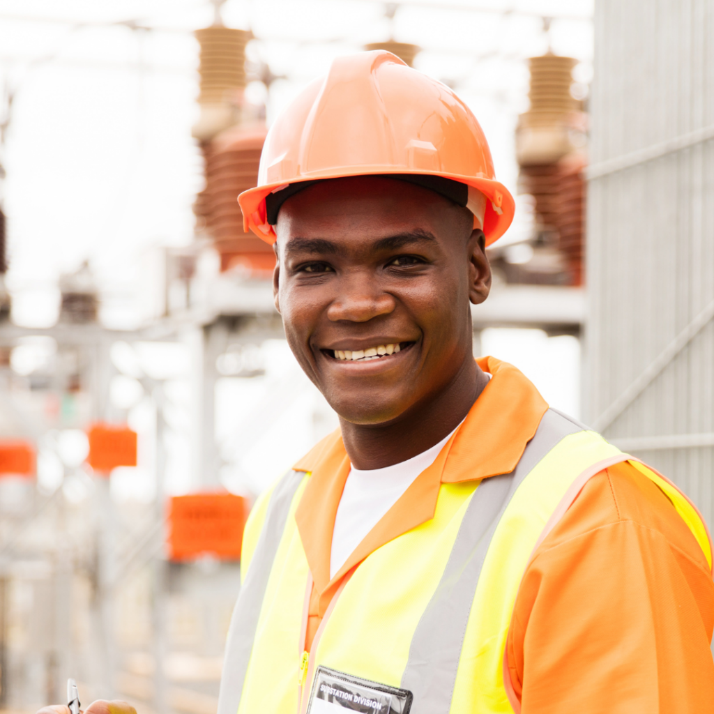 Man in hard hat smiling
